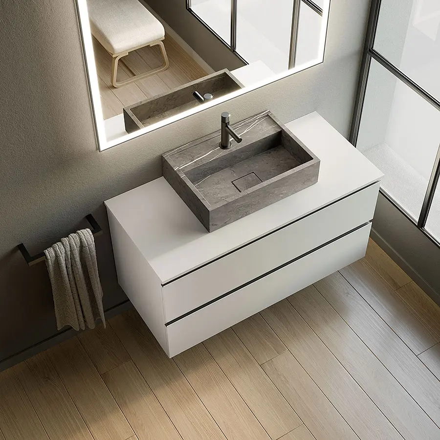 Render fotorrealista de un mueble de baño blanco con lavamanos de piedra, un ejemplo del servicio de render para muebles de Ferrenova.